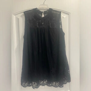 Black plus size top with beautiful lace accents sleeveless
